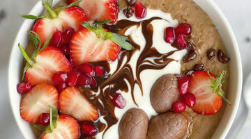Chocolate porridge breakfast bowl with strawberries